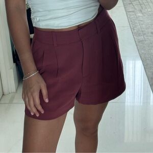 Babaton Pleated Mini Short size 6 color burgundy aritzia